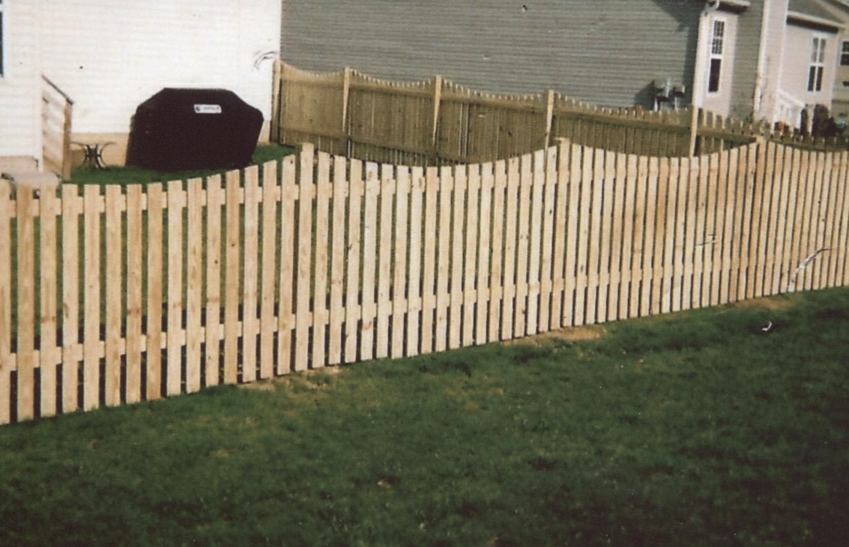 Wooden fence in backyard lane