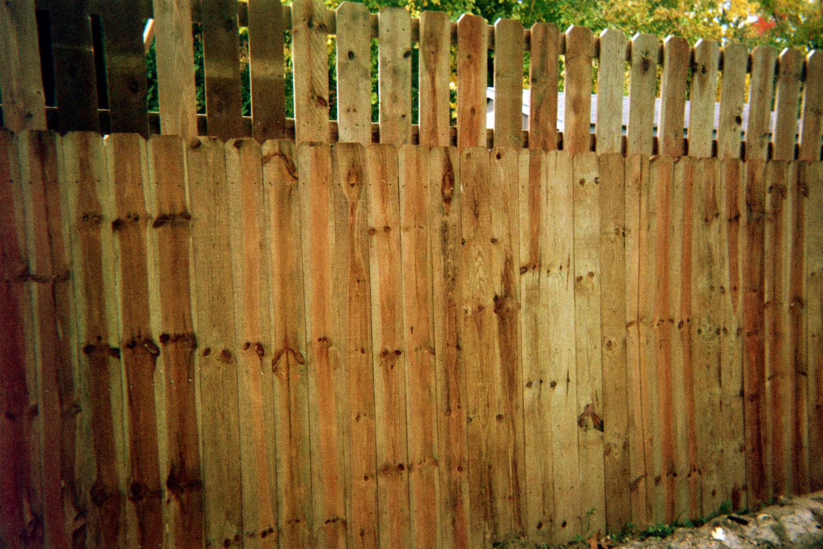 Rustic wooden fence outdoors