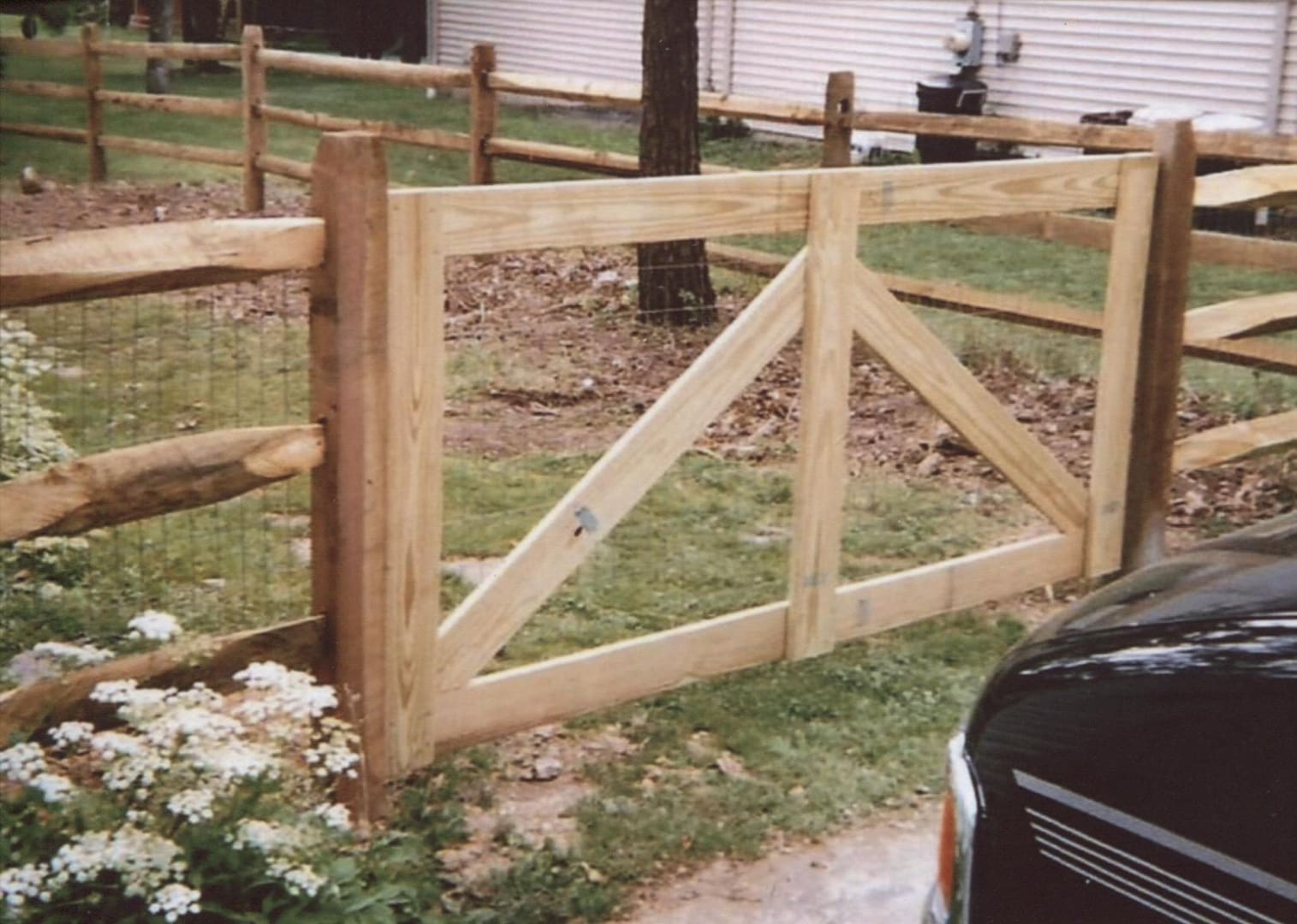 Wooden gate with triangle design