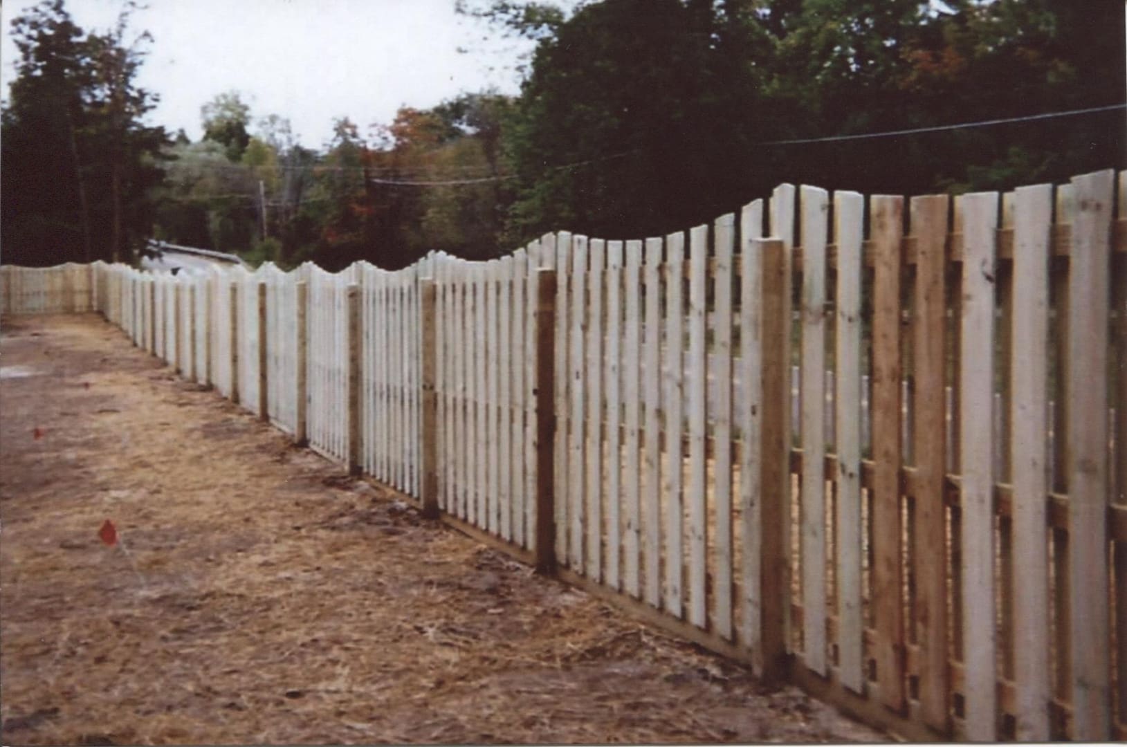 Wooden fence along a rural path
