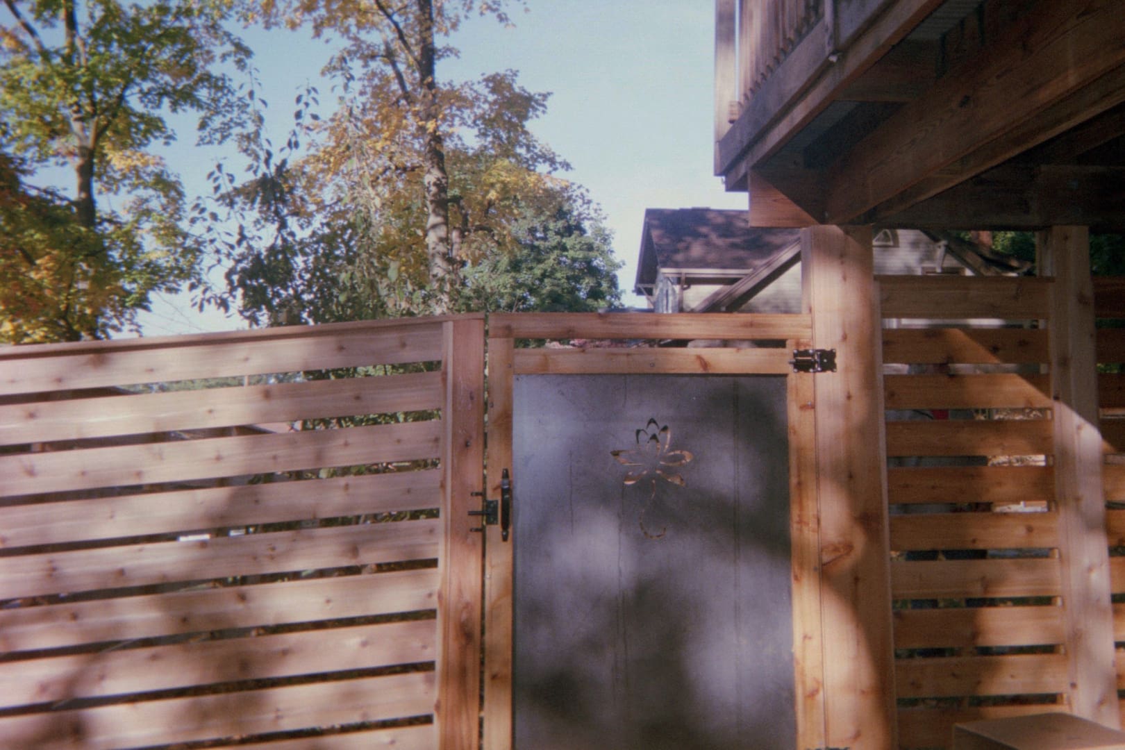 Wooden fence with metal gate